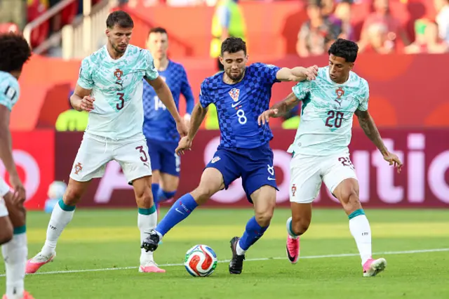 Mateo Kovacic of Croatia and Joao Cancelo of Portugal compete for the ball
