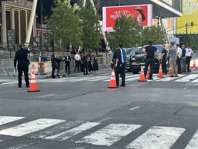Several black SUVs are seen outside Madison Square Garden