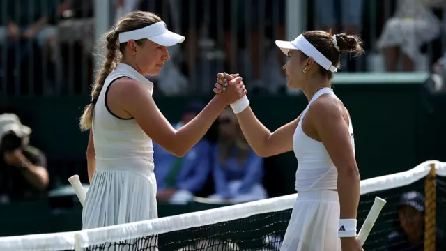 Iva Jovic of United States and Ekaterina Alexandrova shake hands at the net