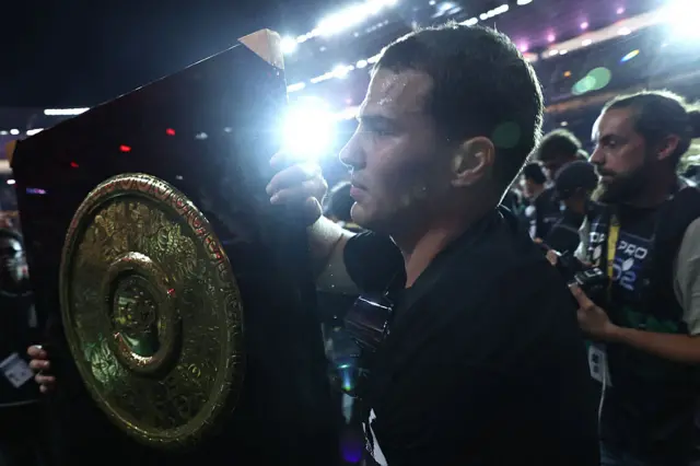 Antoine Dupont celebrates with the Top 14 title