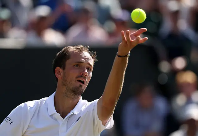 Daniil Medvedev serves