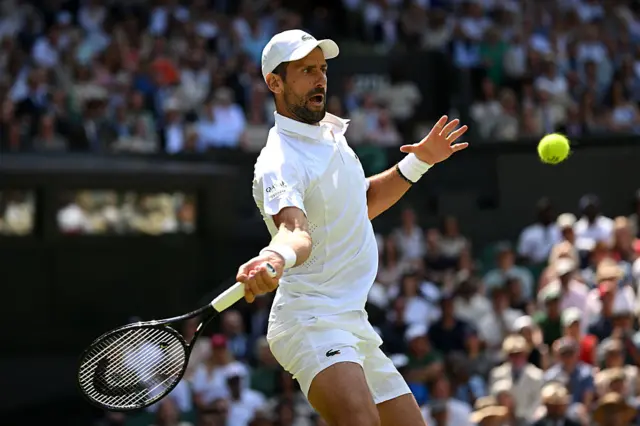 Novak Djokovic of Serbia plays a forehand