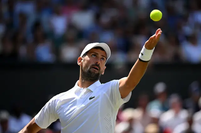 Novak Djokovic of Serbia serves