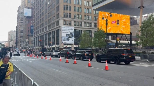 Three black SUVs arriving in a line at Madison Square Gardens