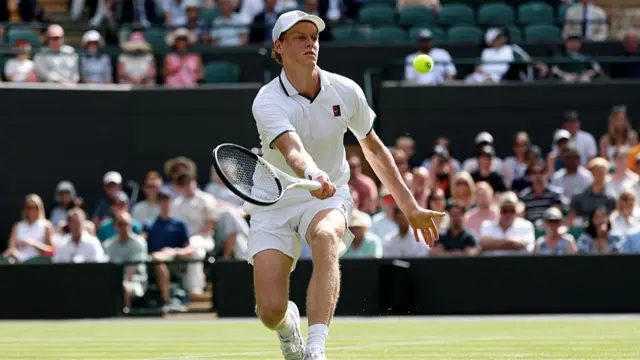 Jannik Sinner of Italy plays a forehand