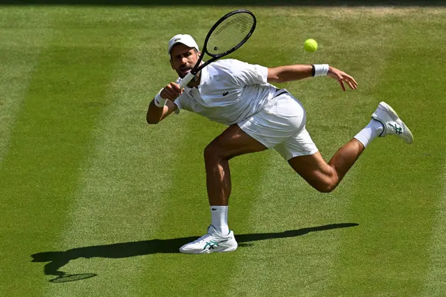 Novak Djokovic of Serbia plays a forehand