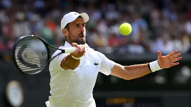 Novak Djokovic of Serbia plays a forehand