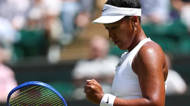 Naomi Osaka of Japan reacts