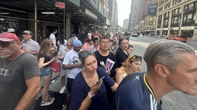 Fans gather in front of Madison Square Garden