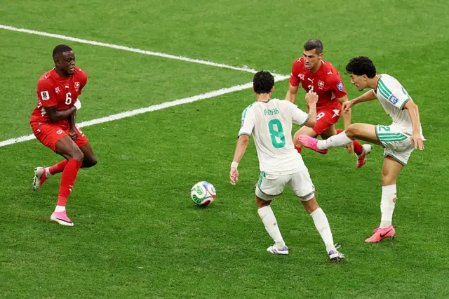 Ibrahim Maza shoots against Remo Freuler
