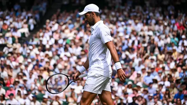 Novak Djokovic reacts