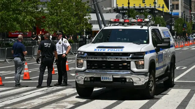 NYPD police vehicle blocks road