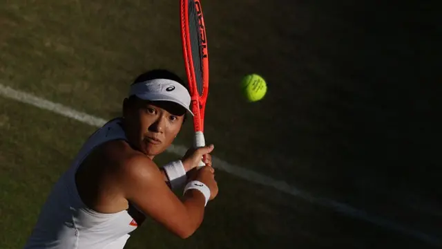 Claire Liu eyes a ball