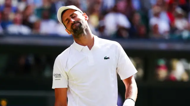 Novak Djokovic reacts