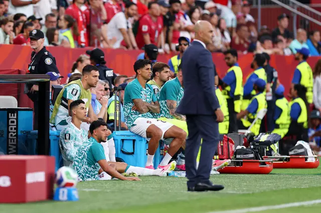 Cristiano Ronaldo #7 of Portugal looks on from the bench