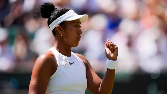 Naomi Osaka celebrates