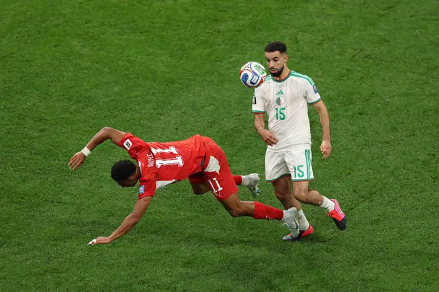 Dan Ndoye is challenged by Rayan Ait-Nouri