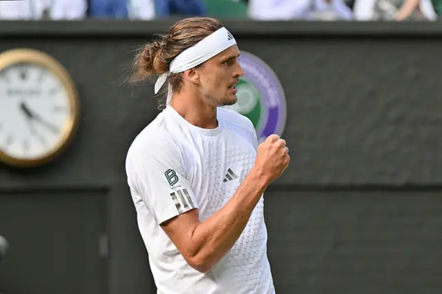 Alexander Zverev holds up his fist