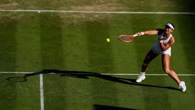 Claire Liu of the United States returns a shot