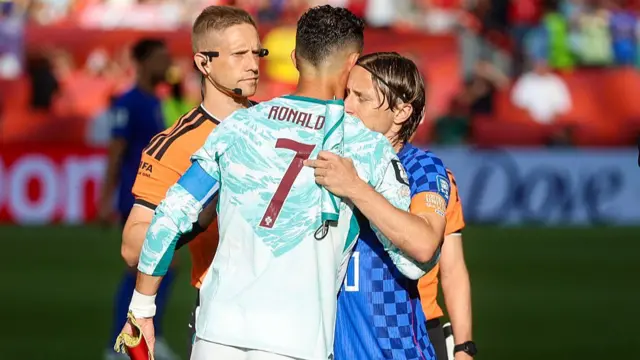 Ronaldo and Modric hugging before the match