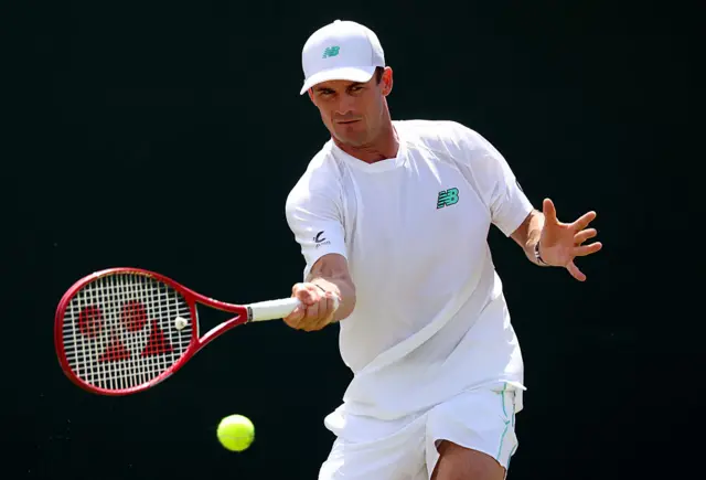 Tommy Paul of United States plays a forehand