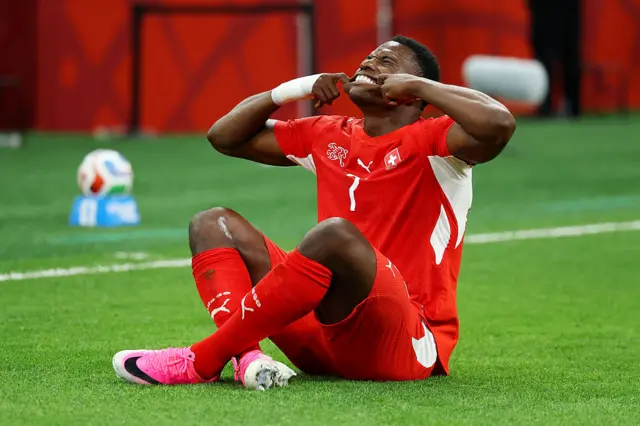 Breel Embolo celebrates giving Switzerland the lead against Algeria