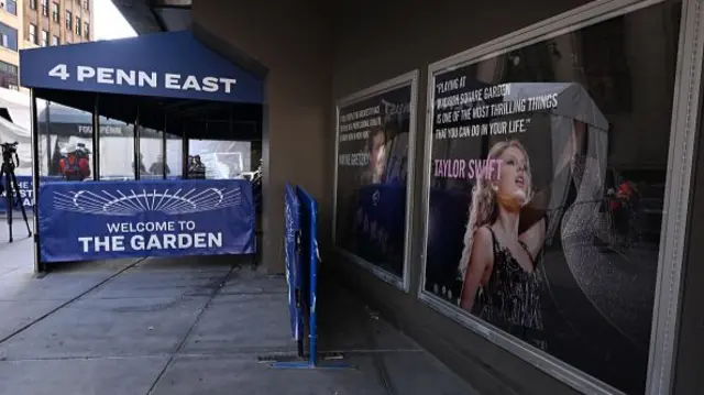 Madison Square Garden exterior with a poster of Taylor Swift on the wall