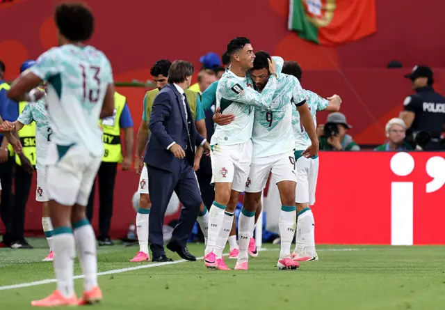 Goncalo Ramos #9 of Portugal celebrates with Cristiano Ronaldo