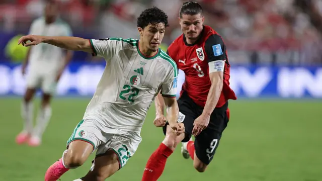 Ibrahim Maza dribbles against Austria