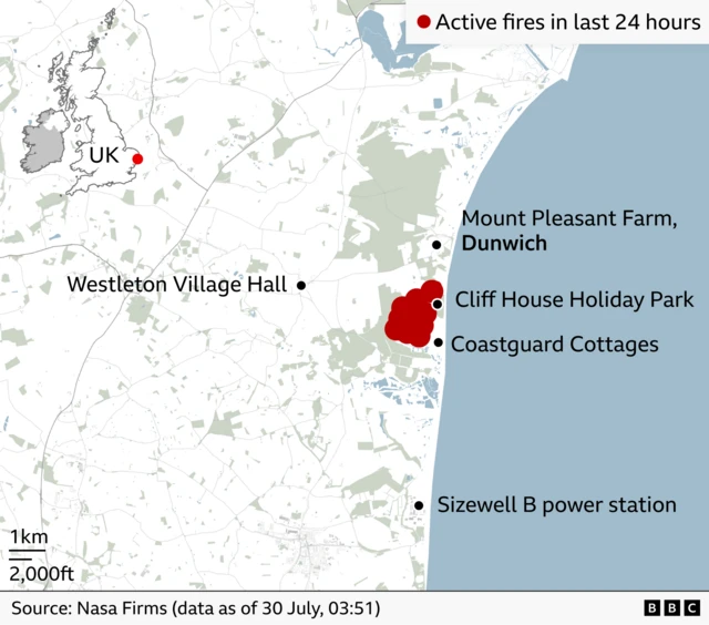 Map of the Suffolk coast showing active fires recorded in the previous 24 hours near Dunwich Heath. Red dots mark a cluster of fire locations around Cliff House Holiday Park on the coast. Mount Pleasant Farm, Coastguard Cottages, Westleton Village Hall are labelled nearby, with Sizewell B power station a few kilometres to the south. An inset map of the UK highlights the location on England’s east coast. Source: Nasa Firms data as of 30 July.