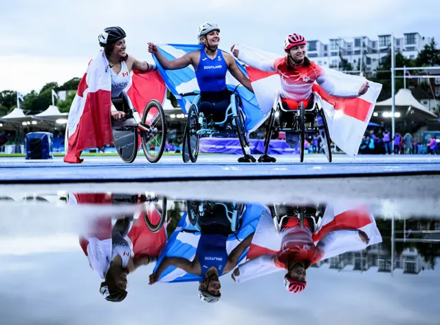 Nandini Sharma of Team Canada, Gold medalist Melanie Woods of Team Scotland and Bronze medalist Ellis Kottas of Team England