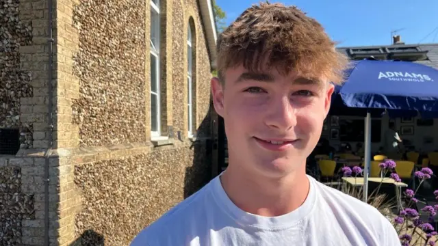 Teenage boy in white T-shirt