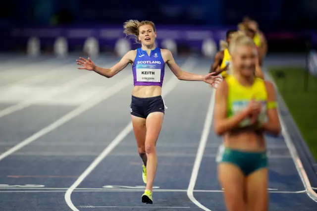 Megan Keith crosses the line