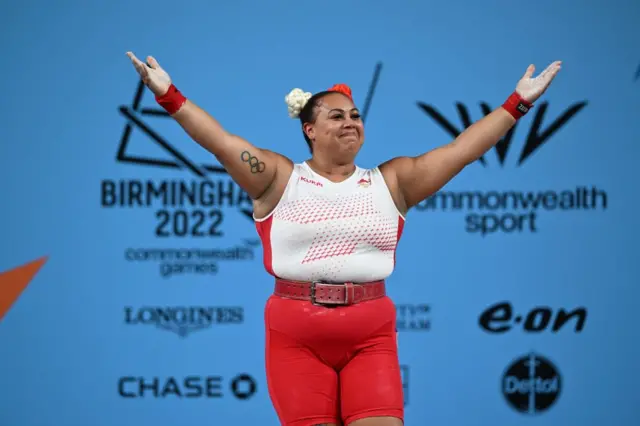 Weightlifting: Commonwealth Games Emily Campbell of England salutes the crowd in the 87kg+ weightlifting