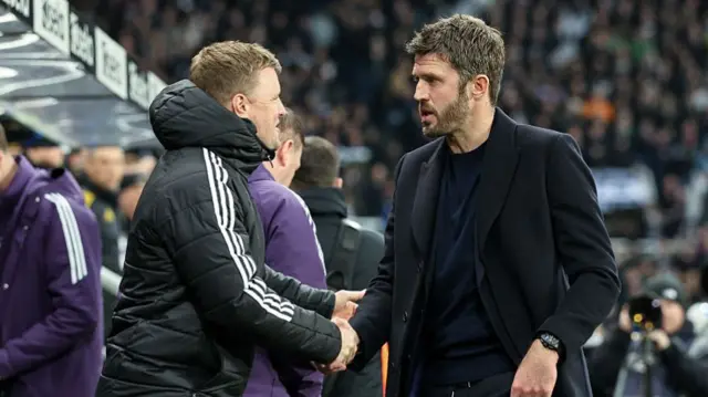 Manchester United head coach Michael Carrick greets Newcastle United head coach Eddie Howe during the Premier League match between Newcastle United and Manchester United at St James' Park.