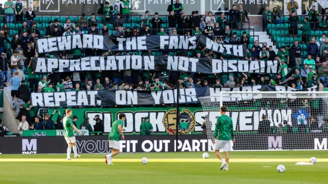 Hibs fan banner that reads: "Reward the fans with appreciation not disdain. Repeat, on your heads be it"