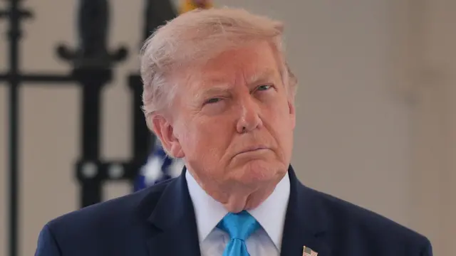 U.S. President Donald Trump looks on on the day he makes an announcement on Freedom Haulers, an initiative to open pathways for military veterans to become commercial truck drivers, during an event at the White House in Washington on July 30
