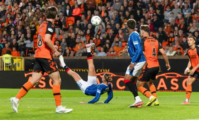 Thelo Aasgaard tries his luck with an overhead kick
