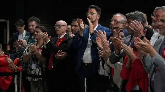 Labour Party supporters react after Bev Craig was declared winner of the Greater Manchester mayoral by-election at the Co-Op Live Arena
