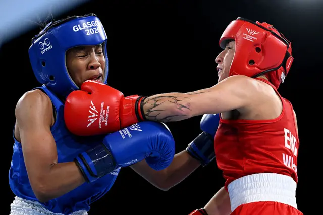 Ruby White (right) lands a punch