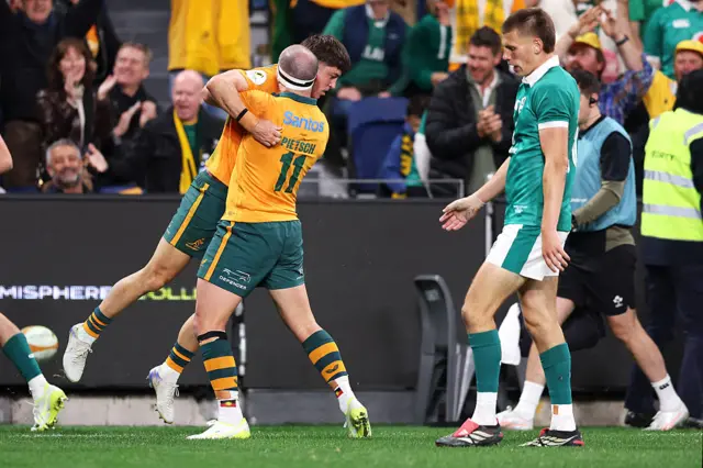 Australia celebrate a try