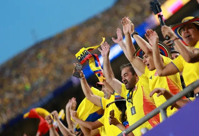 Colombia fans cheer in the stands