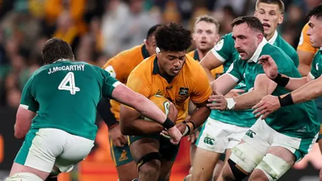 Rob Valetini carries the ball for Australia against Ireland