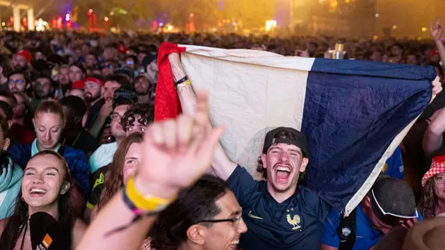 France fans at a festival celebrate