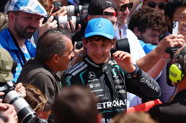 Kimi Antonelli celebrates his sprint victory with his dad