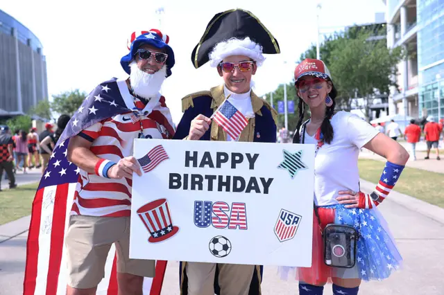 Fans celebrate the 4th of July before the FIFA World Cup