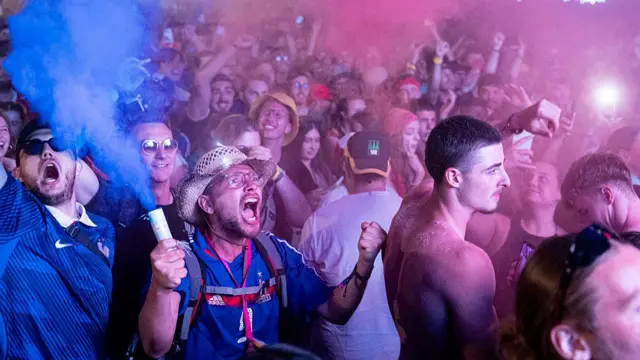 France fans at a festival celebrate