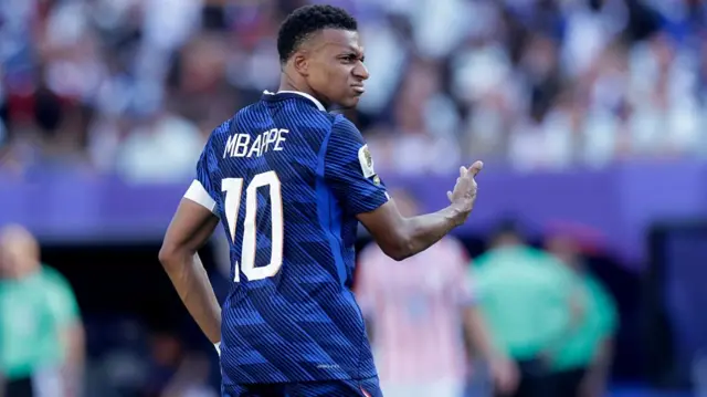 Kylian Mbappe in action