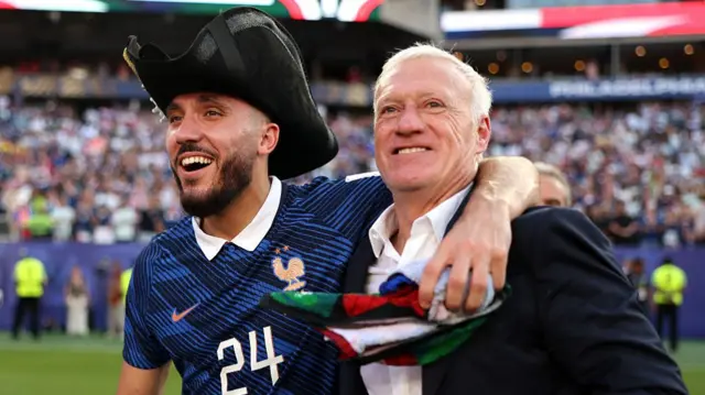 Didier Deschamps and Rayan Cherki