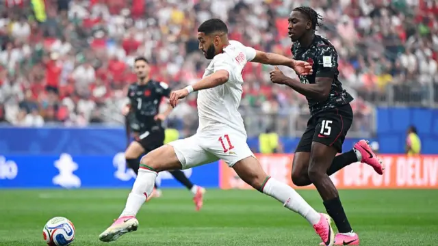Ismael Saibari of Morocco controls the ball against Moise Bombito